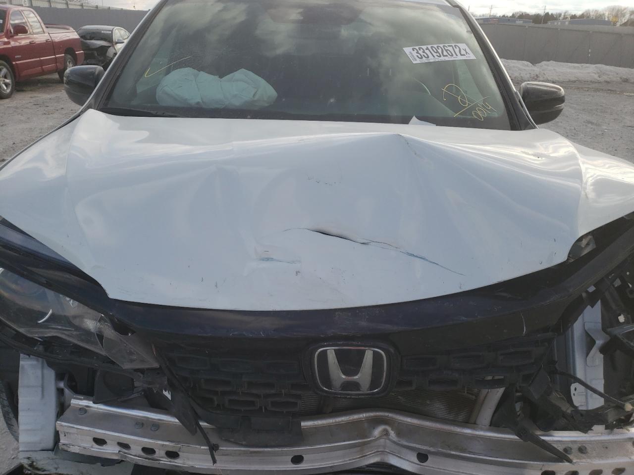 Photo 7 from auction – 2020 HONDA PASSPORT E with VIN 5FNYF8H57LB010014