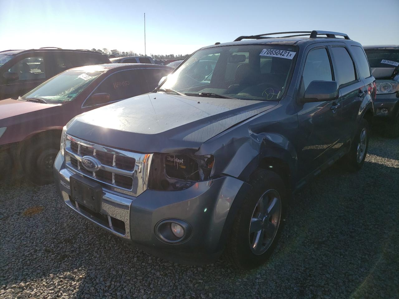 Photo 2 from auction – 2011 FORD ESCAPE LIM with VIN 1FMCU9EG4BKC51702