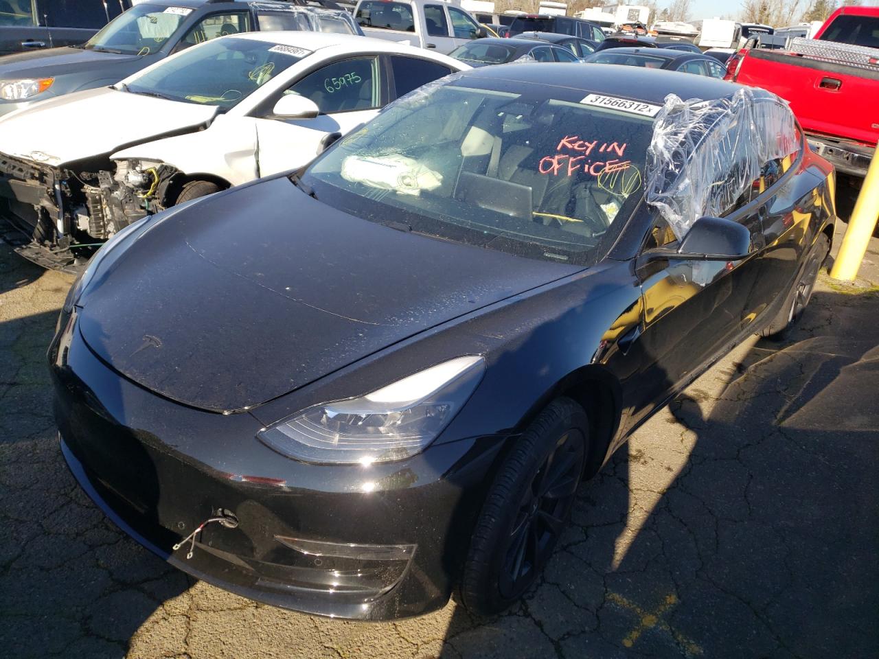 Photo 2 from auction – 2021 TESLA MODEL 3 with VIN 5YJ3E1EB5MF085505