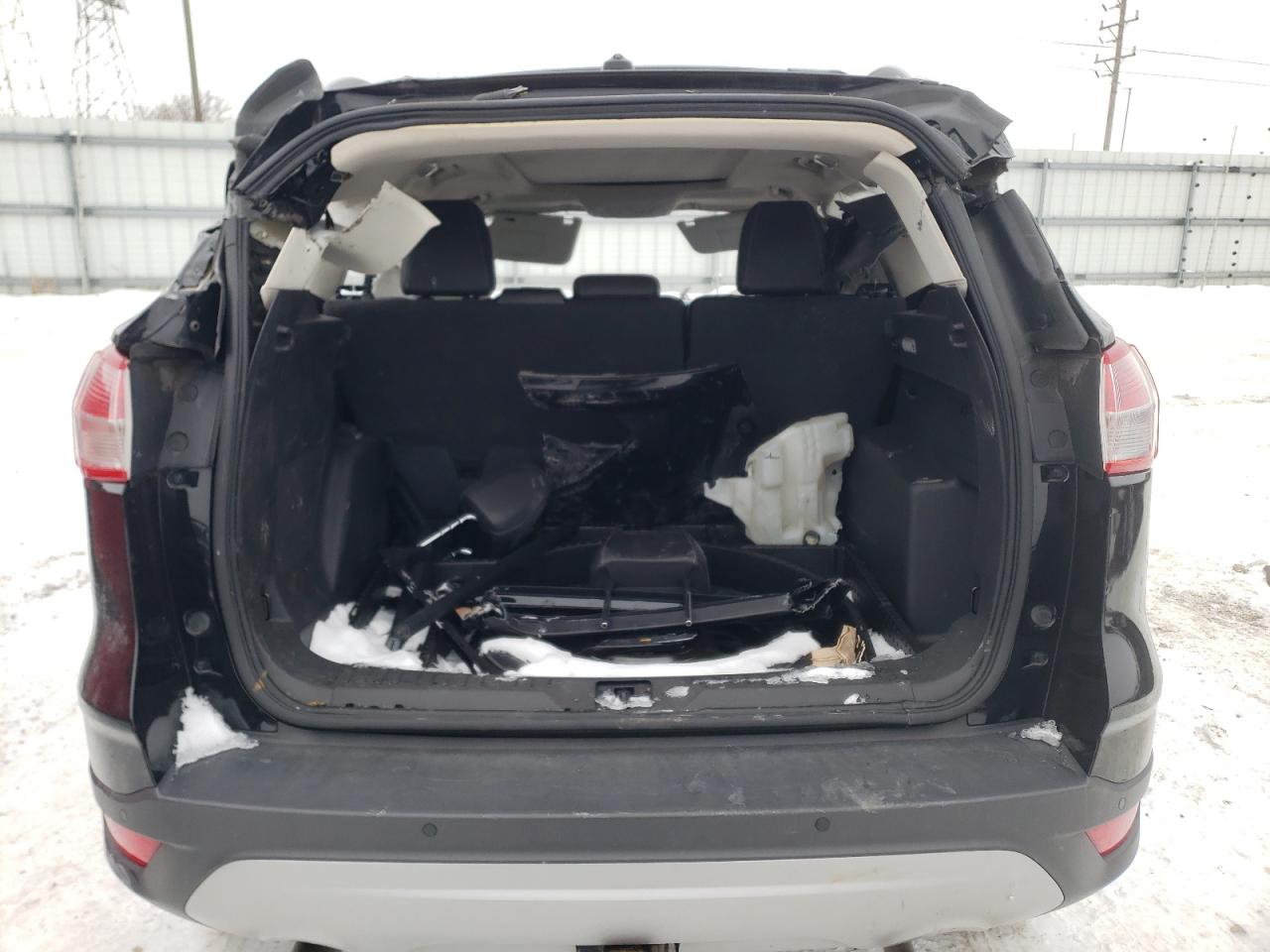 Photo 9 from auction – 2016 FORD ESCAPE TIT with VIN 1FMCU9J92GUC06986
