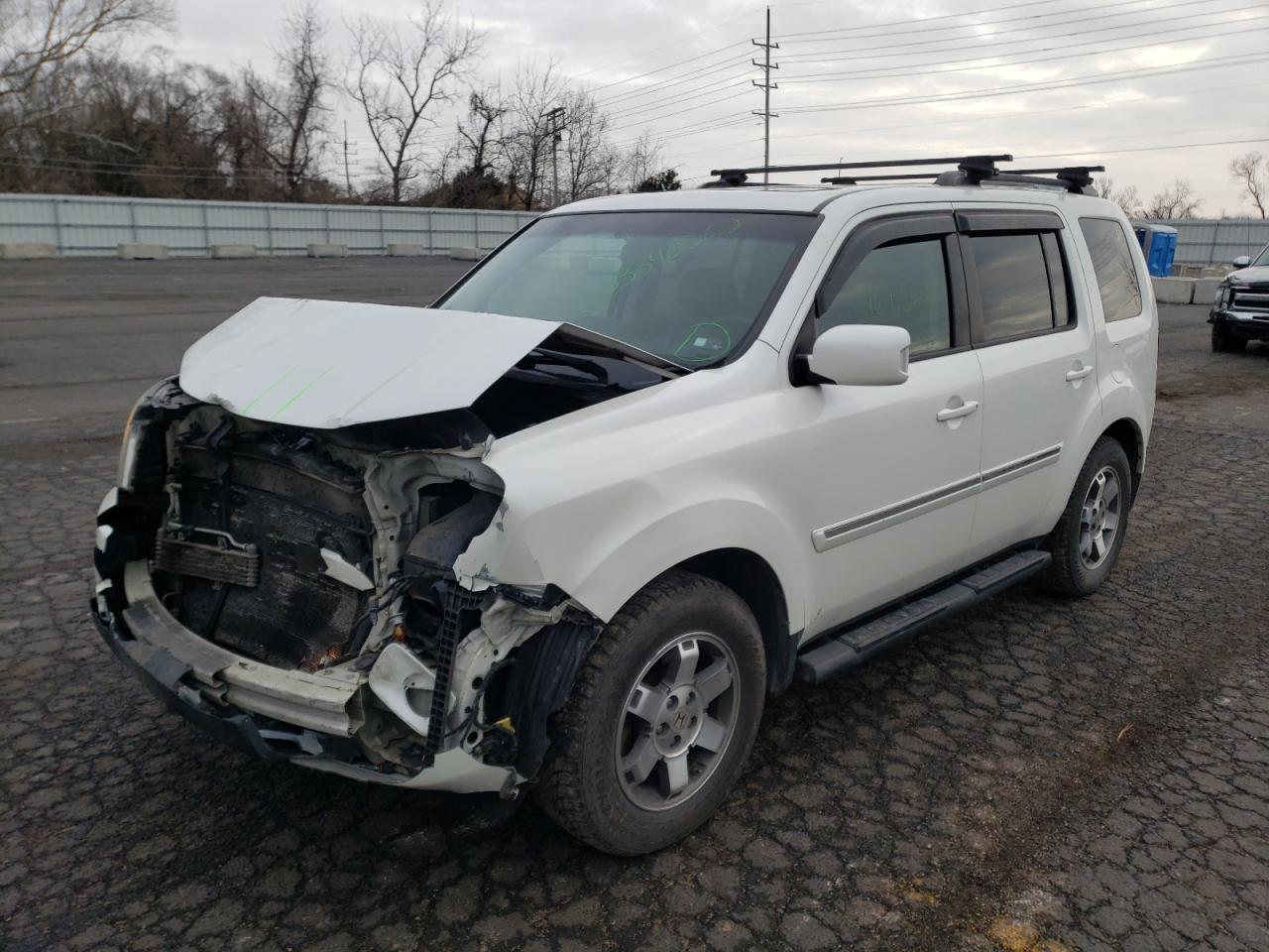 Photo 2 from auction – 2011 HONDA PILOT TOUR with VIN 5FNYF4H99BB048712