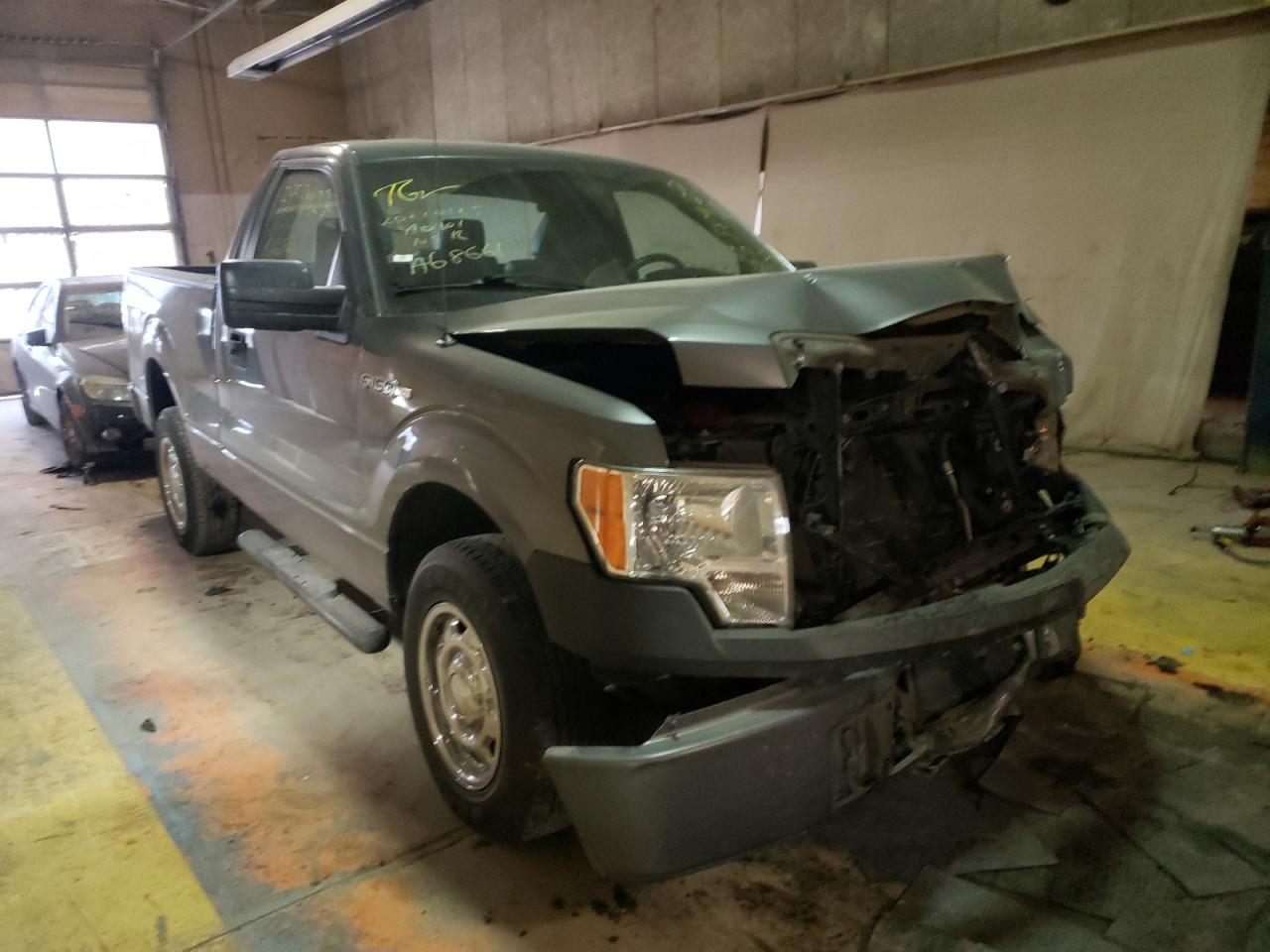FORD F150 2014 with VIN 1FTMF1CM7EFA68661 - Photo from auction