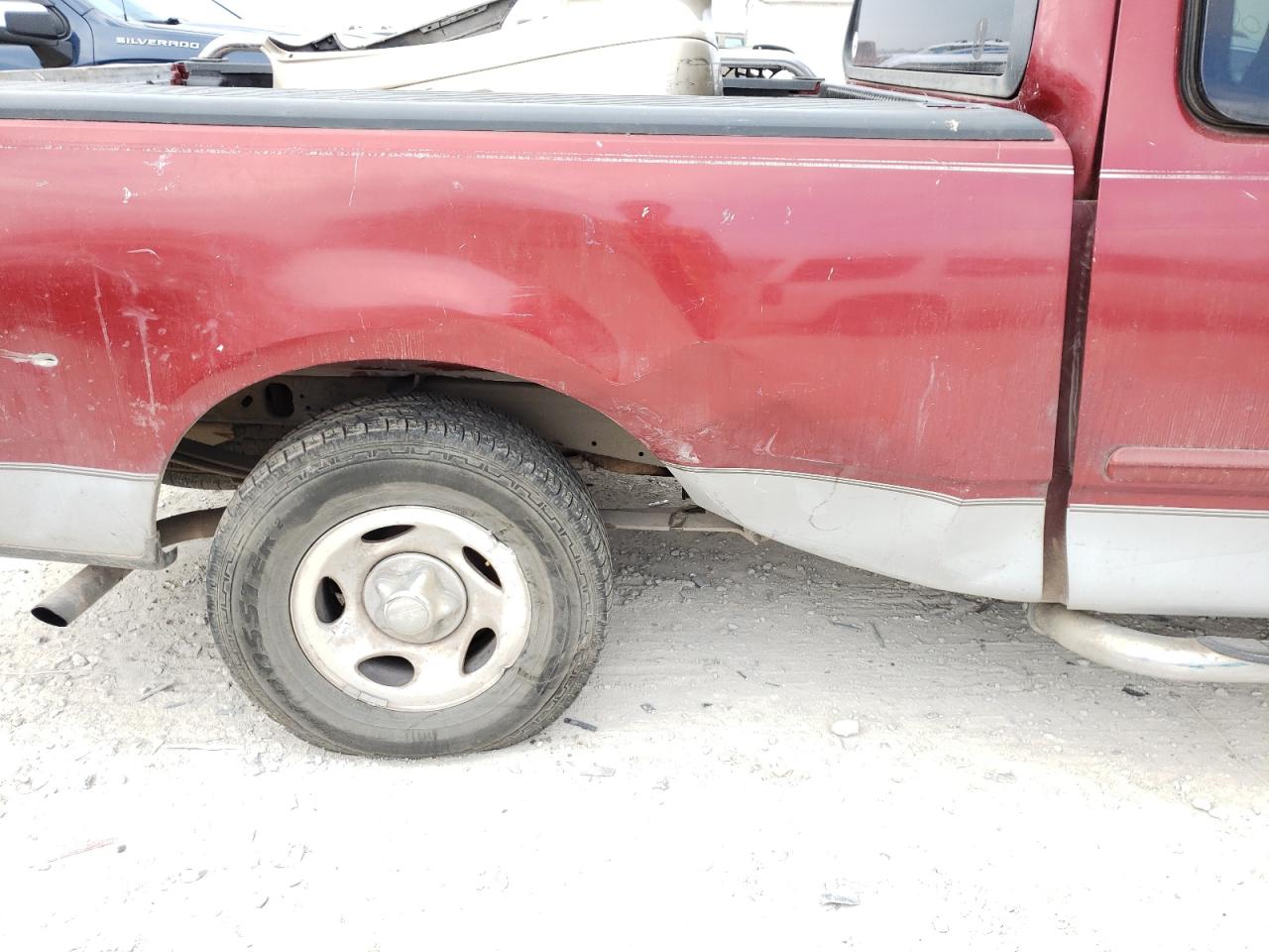 Photo 9 from auction – 1999 FORD F150 with VIN 1FTRX17L5XNB39756