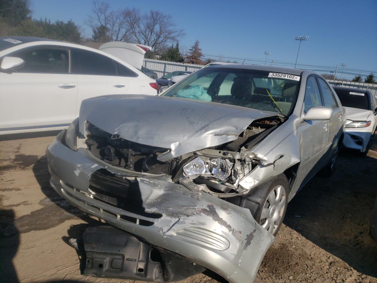 Photo 2 from auction – 2003 TOYOTA CAMRY LE with VIN 4T1BE30K83U142845