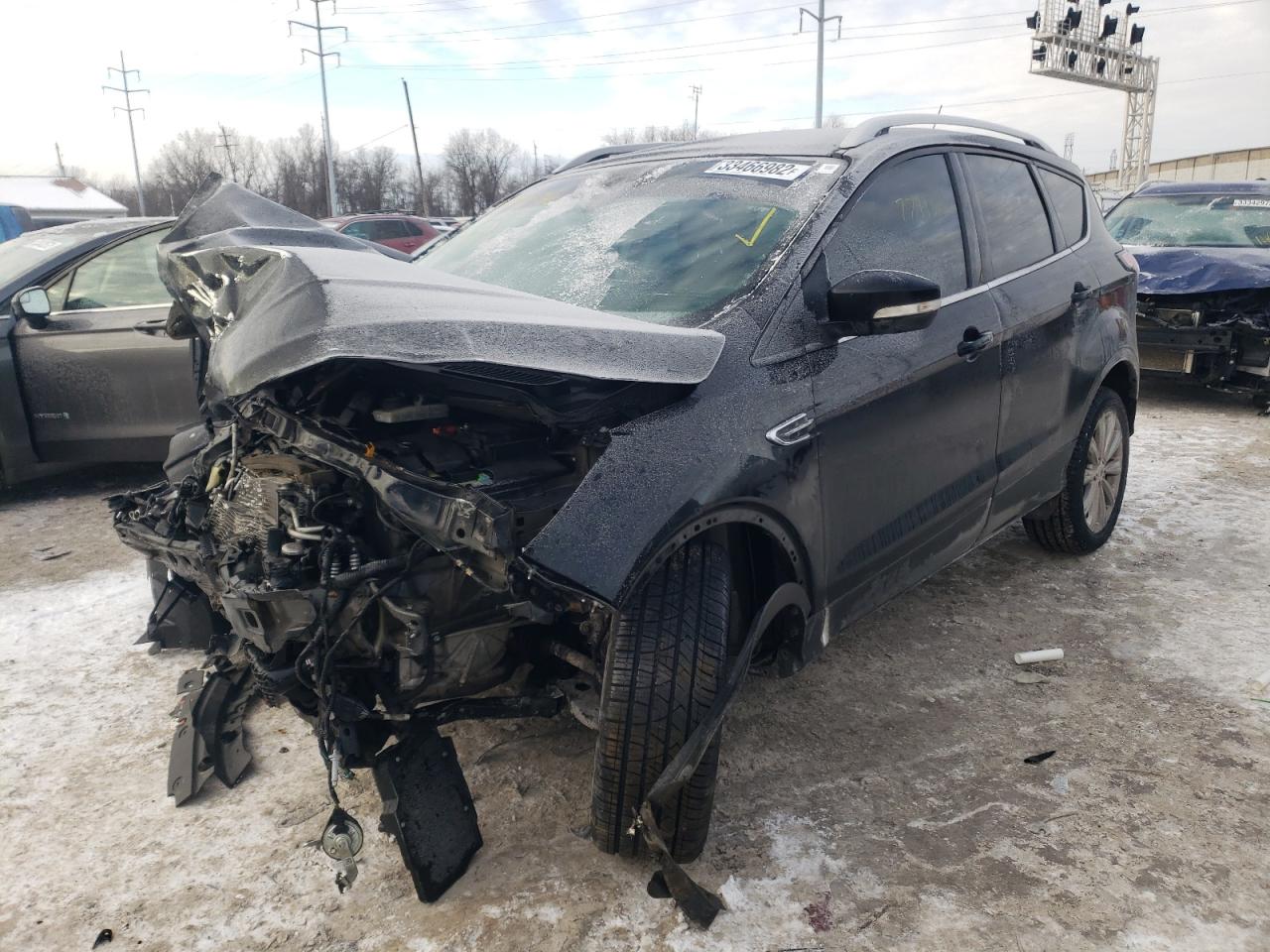 Photo 2 from auction – 2017 FORD ESCAPE with VIN 1FMCU0J98HUB27433