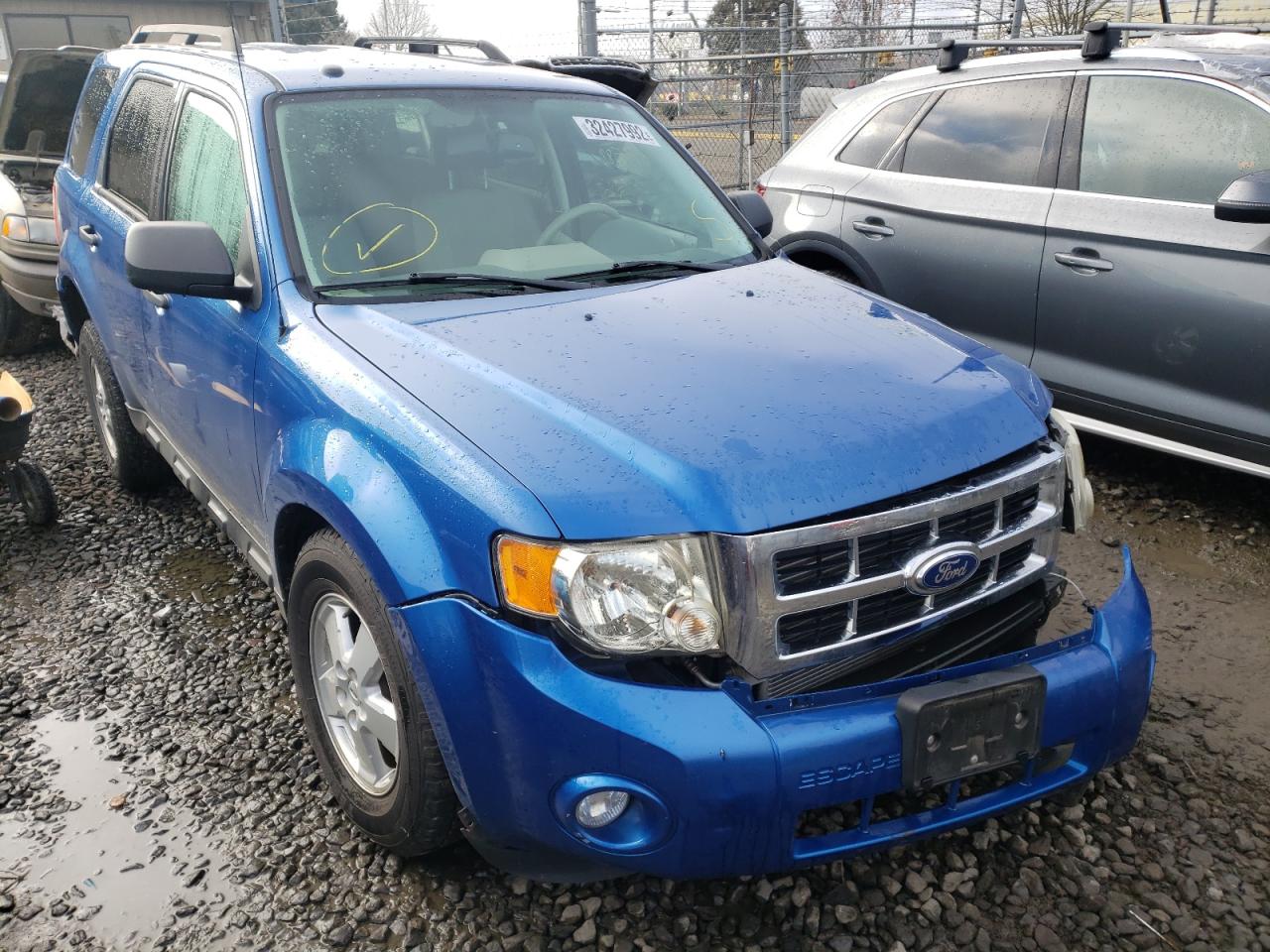 FORD ESCAPE XLT 2011 with VIN 1FMCU0D73BKA94080 - Photo from auction
