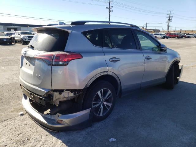 Photo 4 from auction – 2017 TOYOTA RAV4 XLE with VIN 2T3WFREV0HW330925