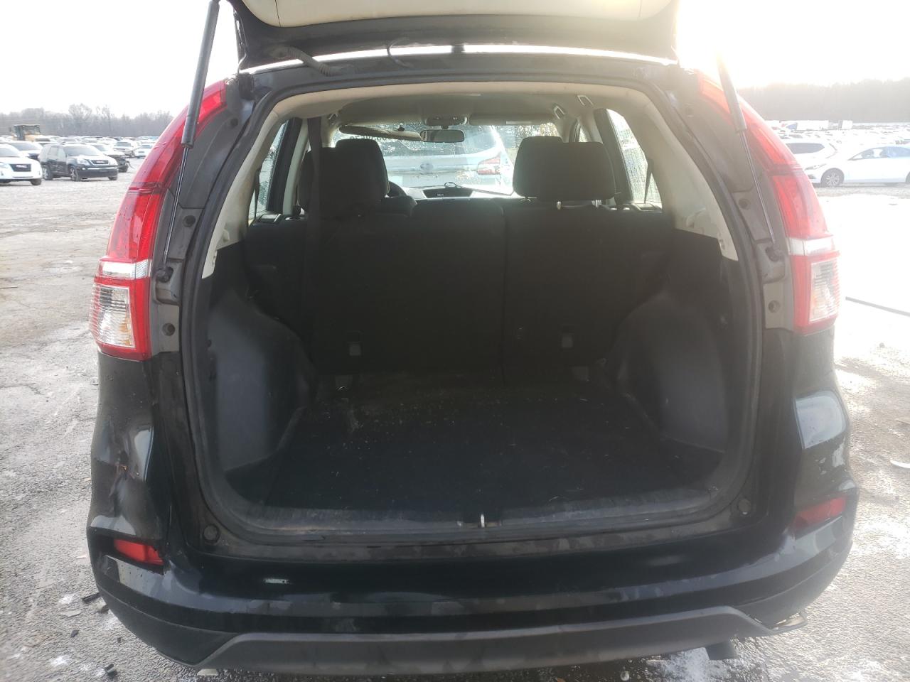 Photo 9 from auction – 2016 HONDA CR-V LX with VIN 2HKRM3H35GH502429