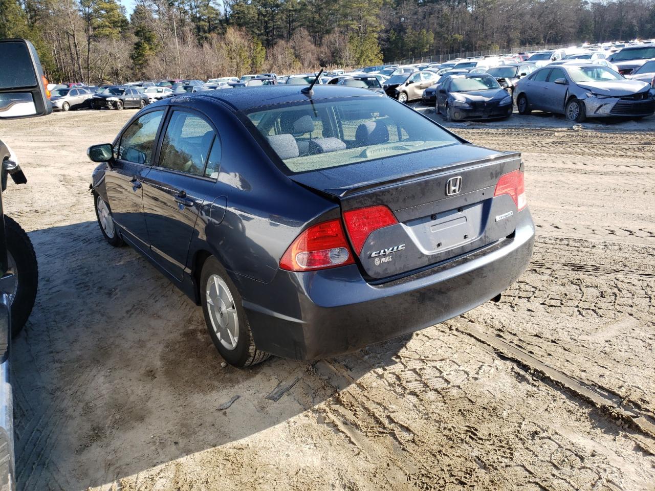 Photo 3 from auction – 2006 HONDA CIVIC HYBR with VIN JHMFA362X6S024366