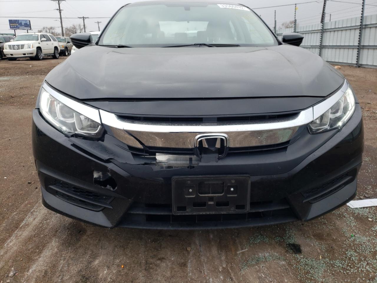Photo 9 from auction – 2018 HONDA CIVIC LX with VIN 2HGFC2F57JH582497