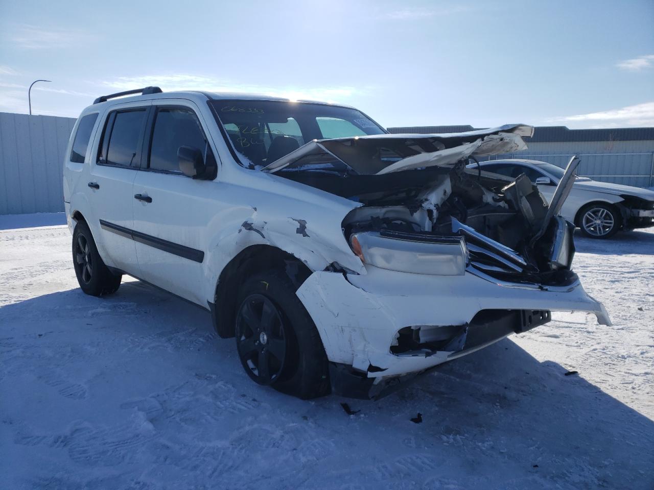 HONDA PILOT LX 2012 with VIN 5FNYF4H27CB068333 - Photo from auction