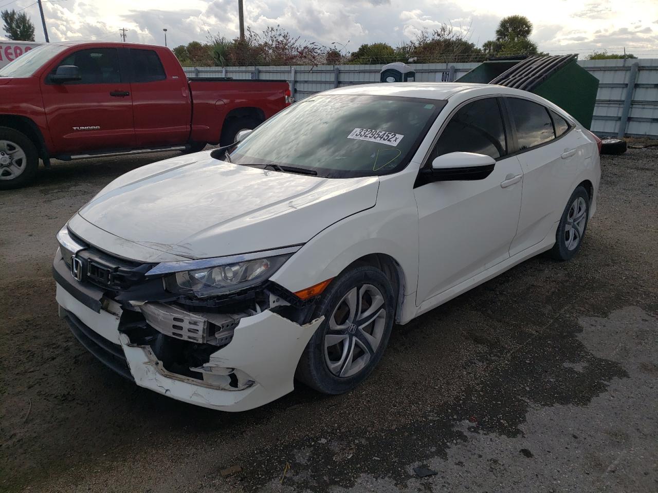 Photo 2 from auction – 2016 HONDA CIVIC LX with VIN 19XFC2F54GE006773