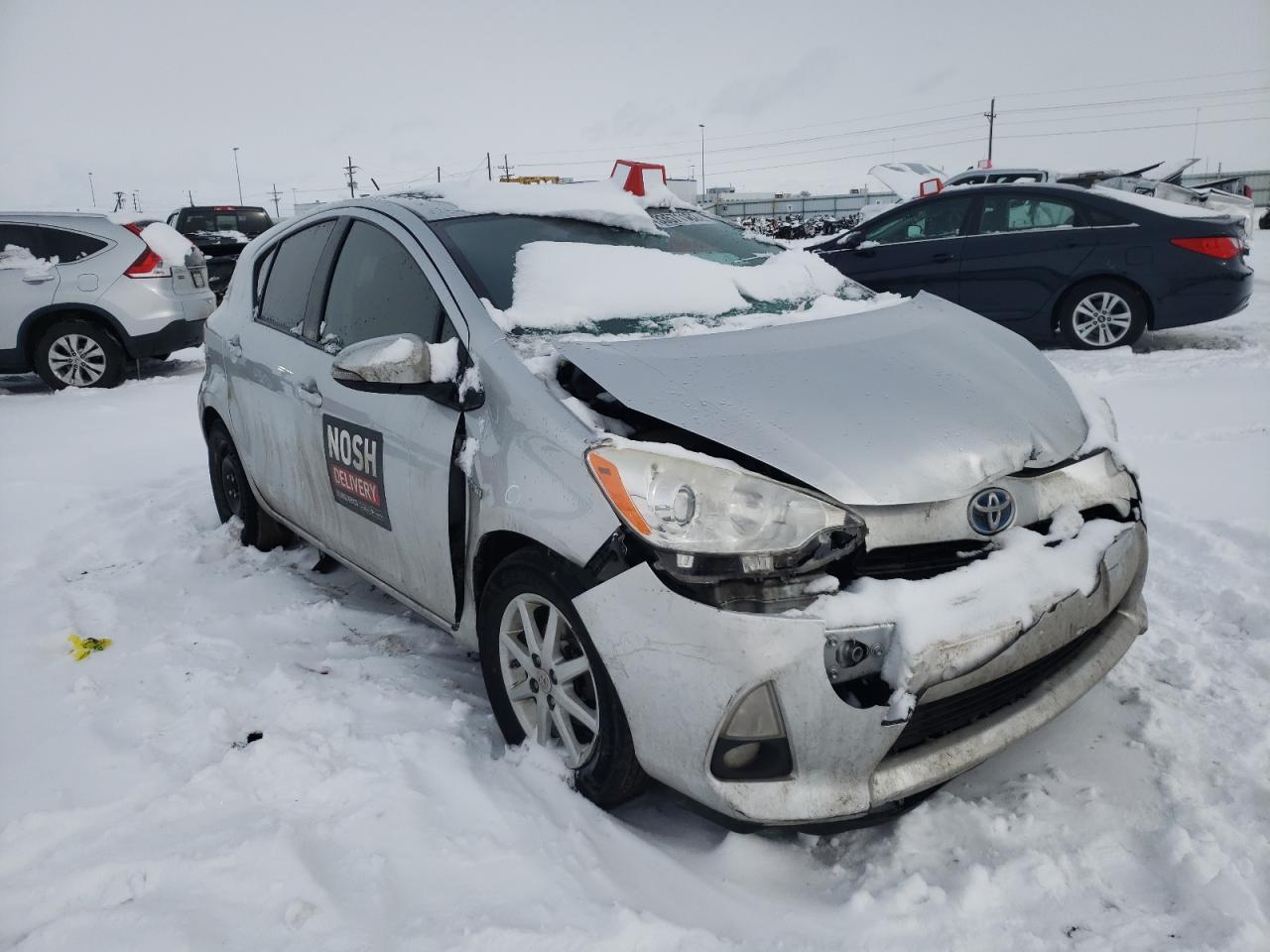 TOYOTA PRIUS C 2013 with VIN JTDKDTB39D1052491 - Photo from auction
