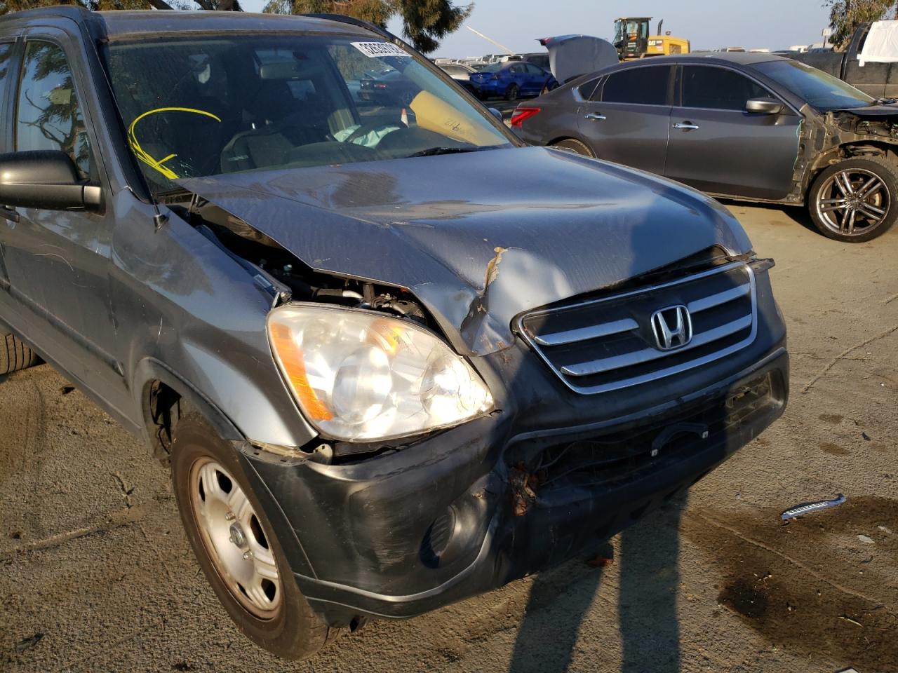 Photo 9 from auction – 2005 HONDA CR-V LX with VIN JHLRD68555C019537