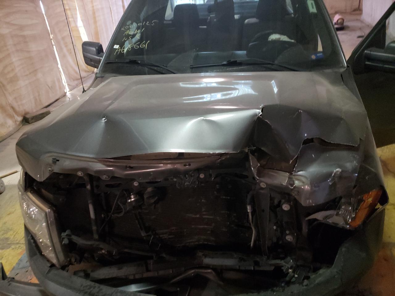 Photo 7 from auction – 2014 FORD F150 with VIN 1FTMF1CM7EFA68661