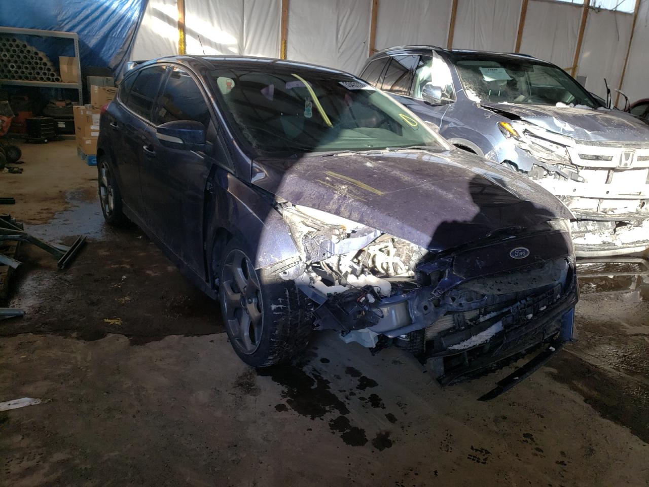 FORD FOCUS ST 2017 with VIN 1FADP3L94HL263472 - Photo from auction