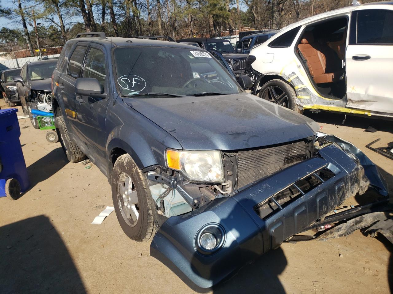 FORD ESCAPE XLT 2011 with VIN 1FMCU0DG0BKA15058 - Photo from auction