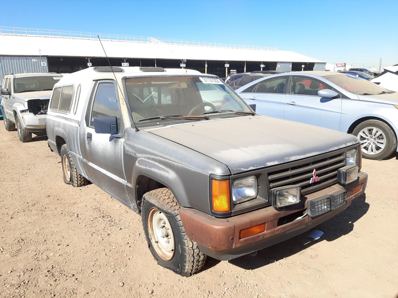 MITSUBISHI MIGHTY MAX 1989 with VIN JA7FL24D6KP011585 - Photo from auction
