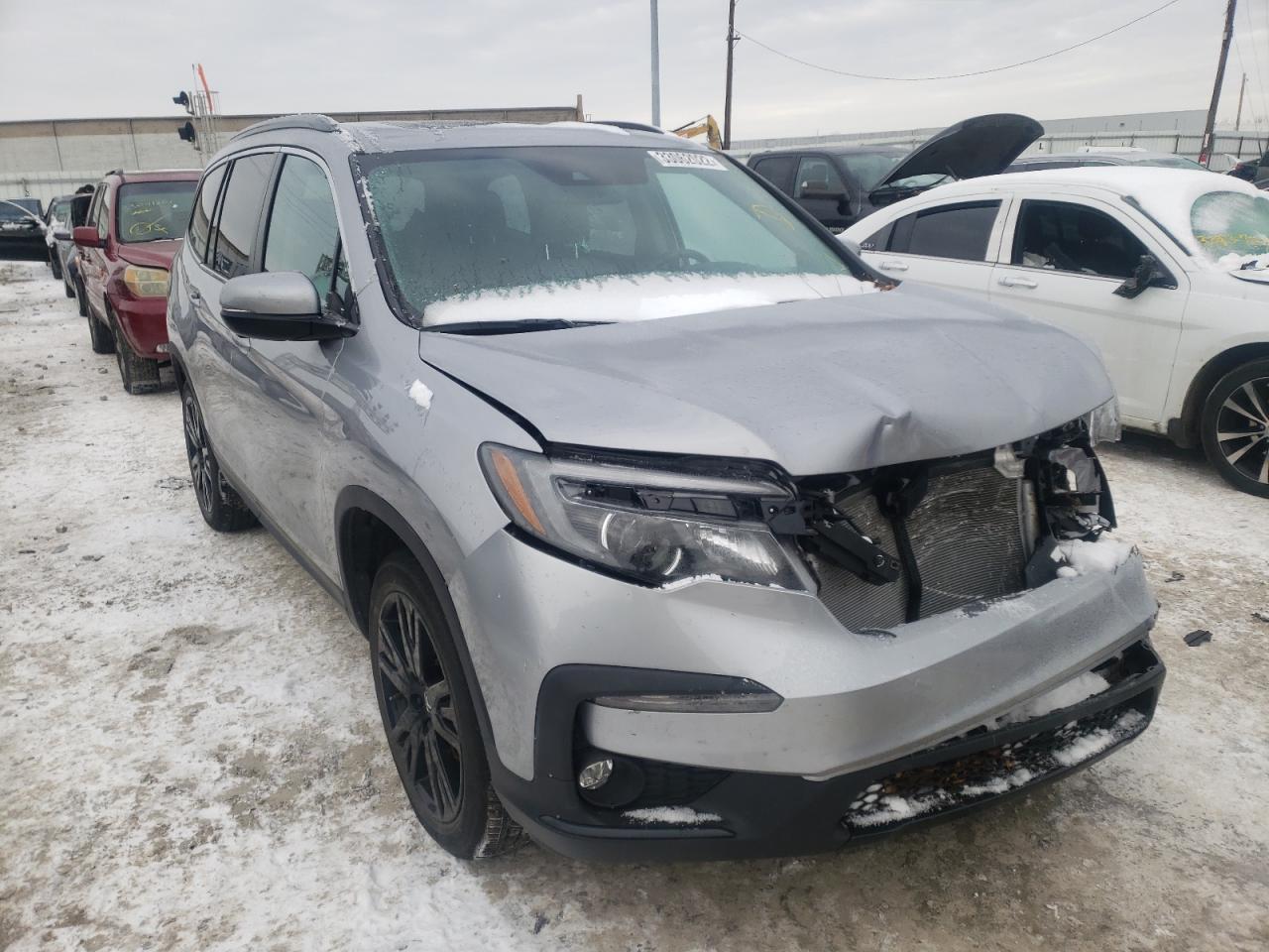 HONDA PILOT SE 2021 with VIN 5FNYF6H25MB080851 - Photo from auction