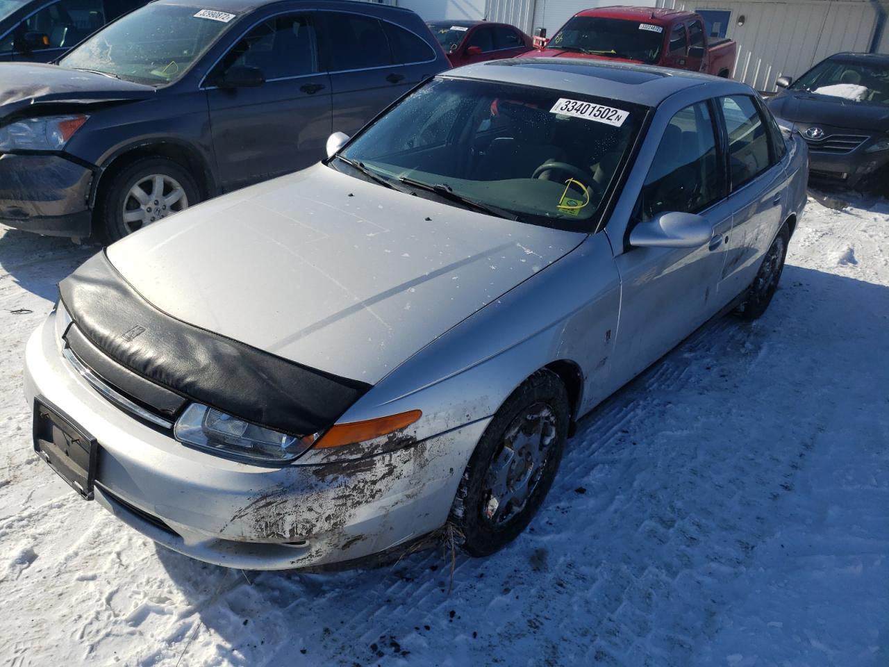 Photo 2 from auction – 2002 SATURN L300 with VIN 1G8JW54R72Y556877