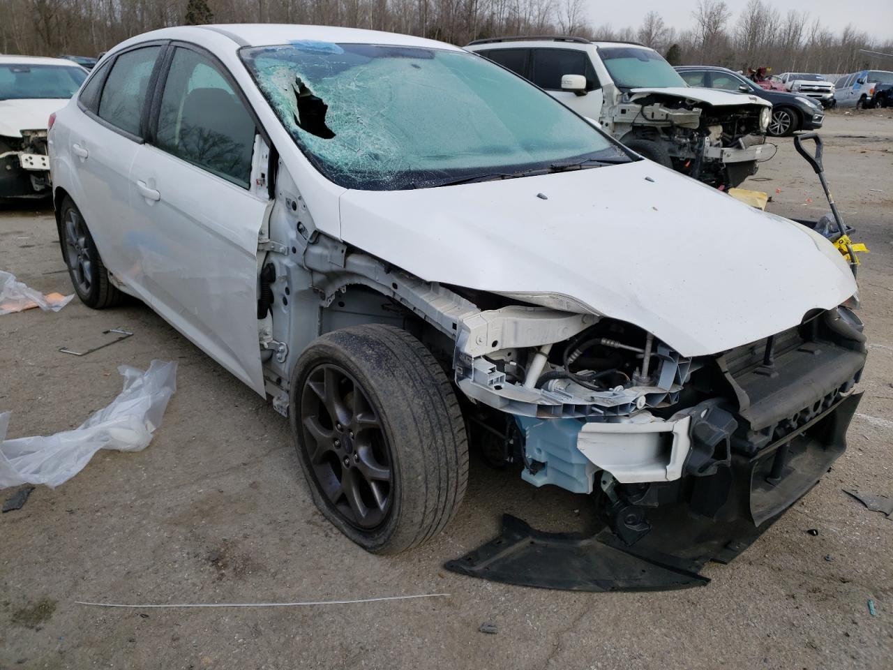 FORD FOCUS SE 2014 with VIN 1FADP3F21EL108467 - Photo from auction