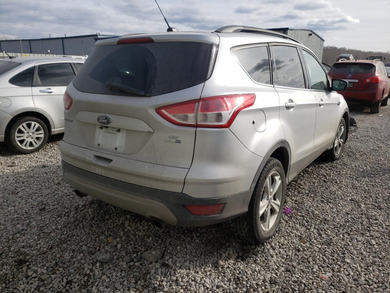 Photo 4 from auction – 2016 FORD ESCAPE SE with VIN 1FMCU9GX7GUB95974