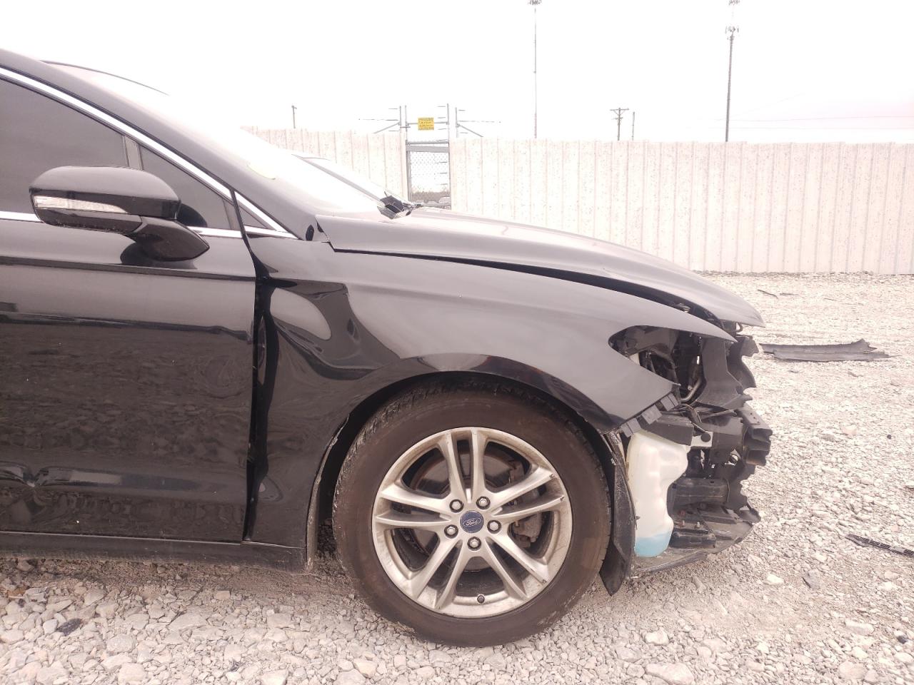 Photo 9 from auction – 2014 FORD FUSION TIT with VIN 3FA6P0D92ER374220