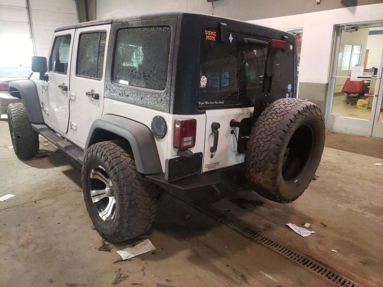 Photo 3 from auction – 2014 JEEP WRANGLER U with VIN 1C4BJWDG5EL319514