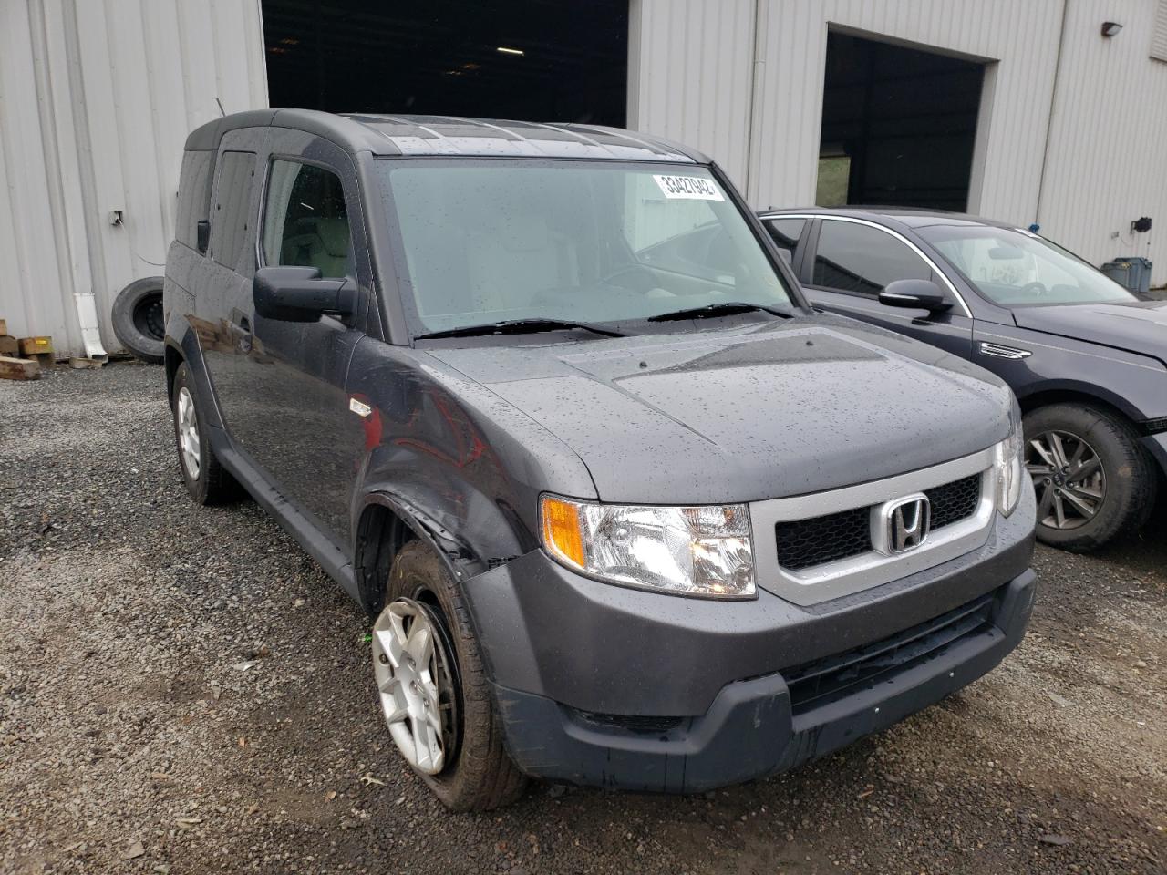 HONDA ELEMENT LX 2011 with VIN 5J6YH2H32BL006111 - Photo from auction