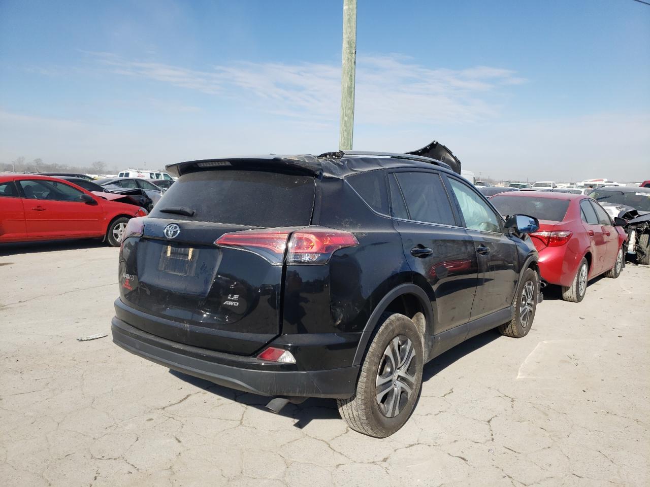 Photo 4 from auction – 2018 TOYOTA RAV4 LE with VIN 2T3BFREV5JW744724