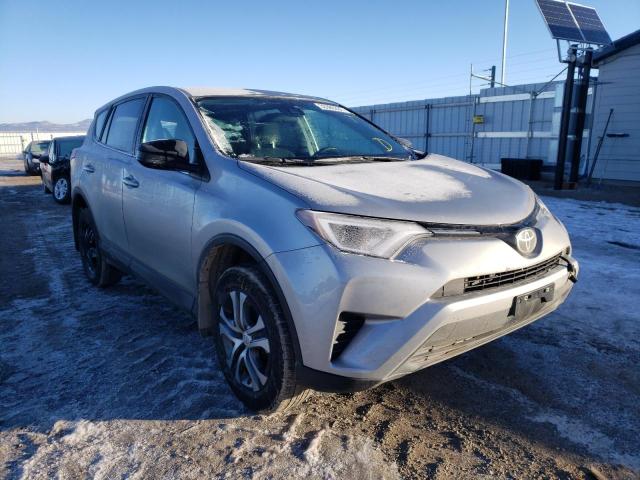 TOYOTA RAV4 LE 2018 with VIN 2T3BFREV0JW846450 - Photo from auction