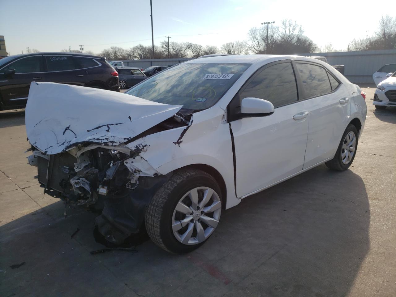 Photo 2 from auction – 2015 TOYOTA COROLLA L with VIN 5YFBURHE5FP265951
