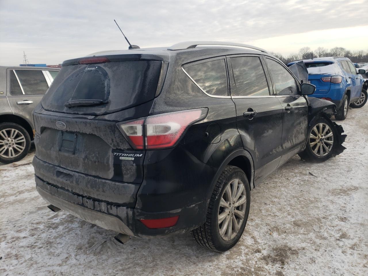Photo 4 from auction – 2017 FORD ESCAPE with VIN 1FMCU0J98HUB27433