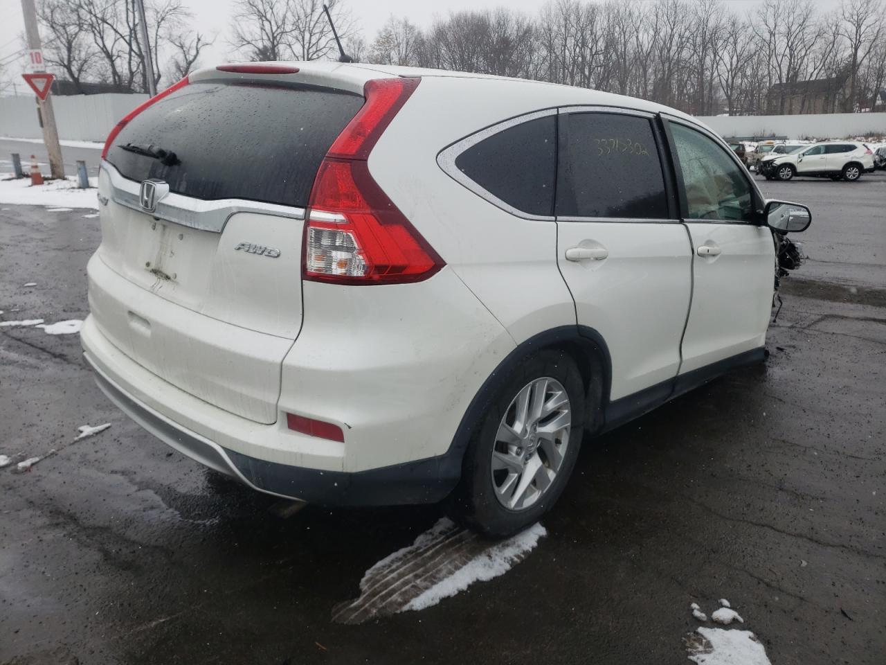 Photo 4 from auction – 2016 HONDA CR-V EX with VIN 5J6RM4H54GL043004