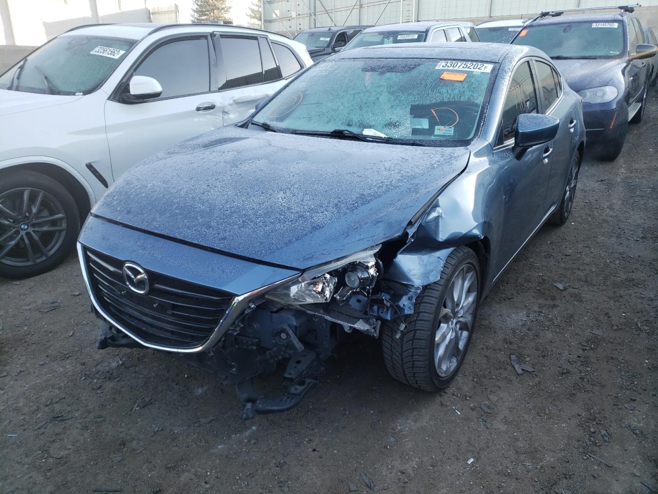 Photo 2 from auction – 2015 MAZDA 3 TOURING with VIN JM1BM1V34F1220766