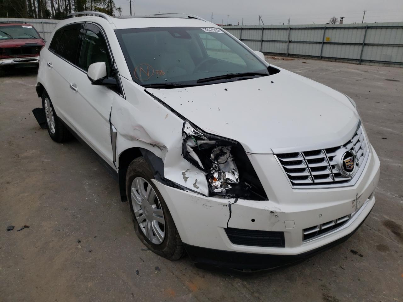 CADILLAC SRX 2015 with VIN 3GYFNBE34FS574008 - Photo from auction