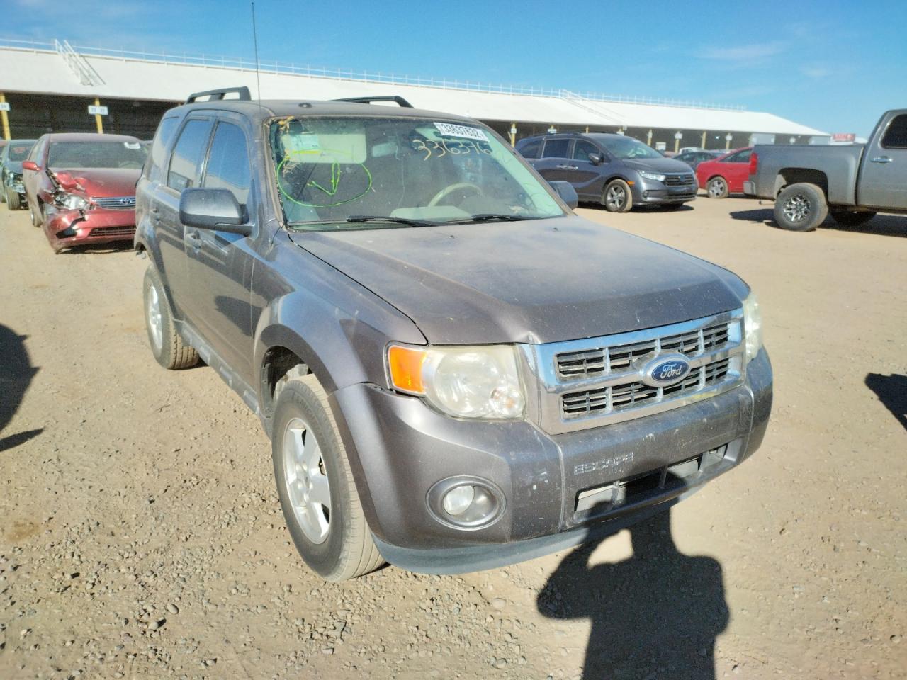 FORD ESCAPE XLT 2012 with VIN 1FMCU0D71CKC85126 - Photo from auction