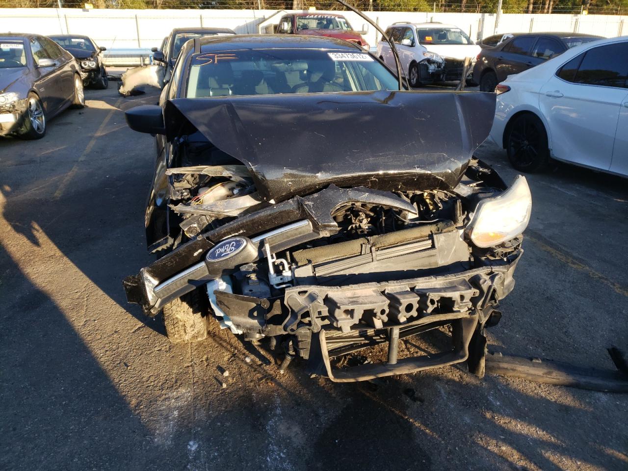 Photo 9 from auction – 2012 FORD FOCUS S with VIN 1FAHP3E26CL371179