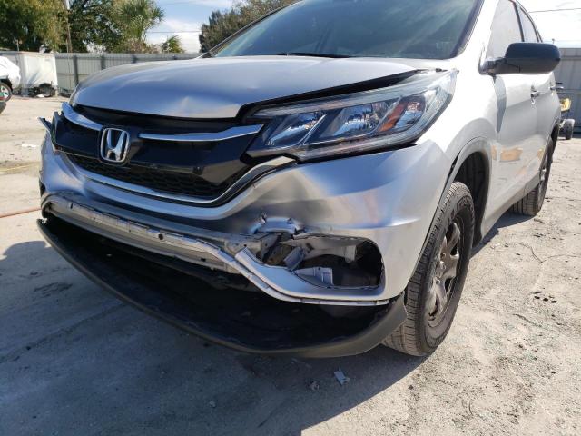 Photo 9 from auction – 2015 HONDA CR-V LX with VIN 5J6RM4H33FL058123