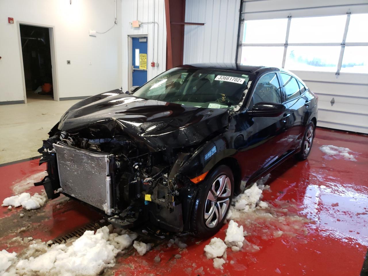 Photo 2 from auction – 2017 HONDA CIVIC LX with VIN 19XFC2F52HE222588