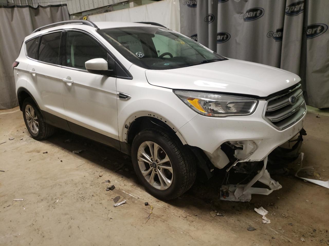 FORD ESCAPE SE 2018 with VIN 1FMCU0GD5JUA11382 - Photo from auction