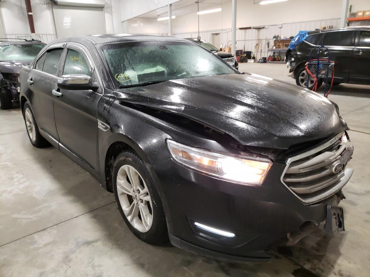 FORD TAURUS SEL 2013 with VIN 1FAHP2E85DG140198 - Photo from auction