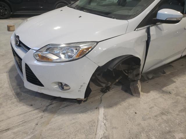 Photo 9 from auction – 2012 FORD FOCUS SEL with VIN 1FAHP3M23CL477218