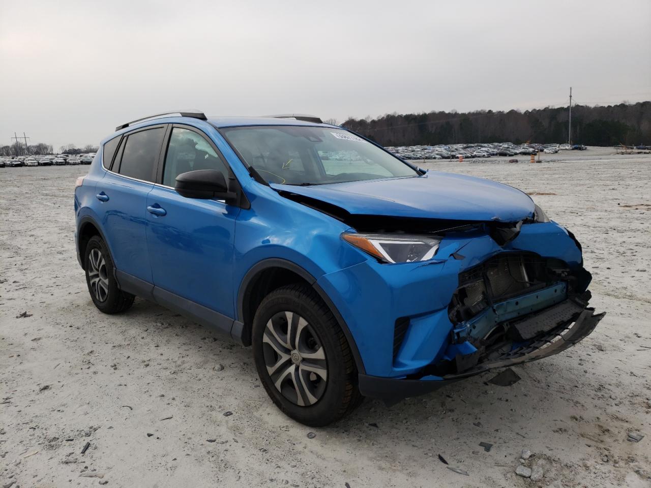 TOYOTA RAV4 LE 2017 with VIN 2T3BFREV0HW560169 - Photo from auction