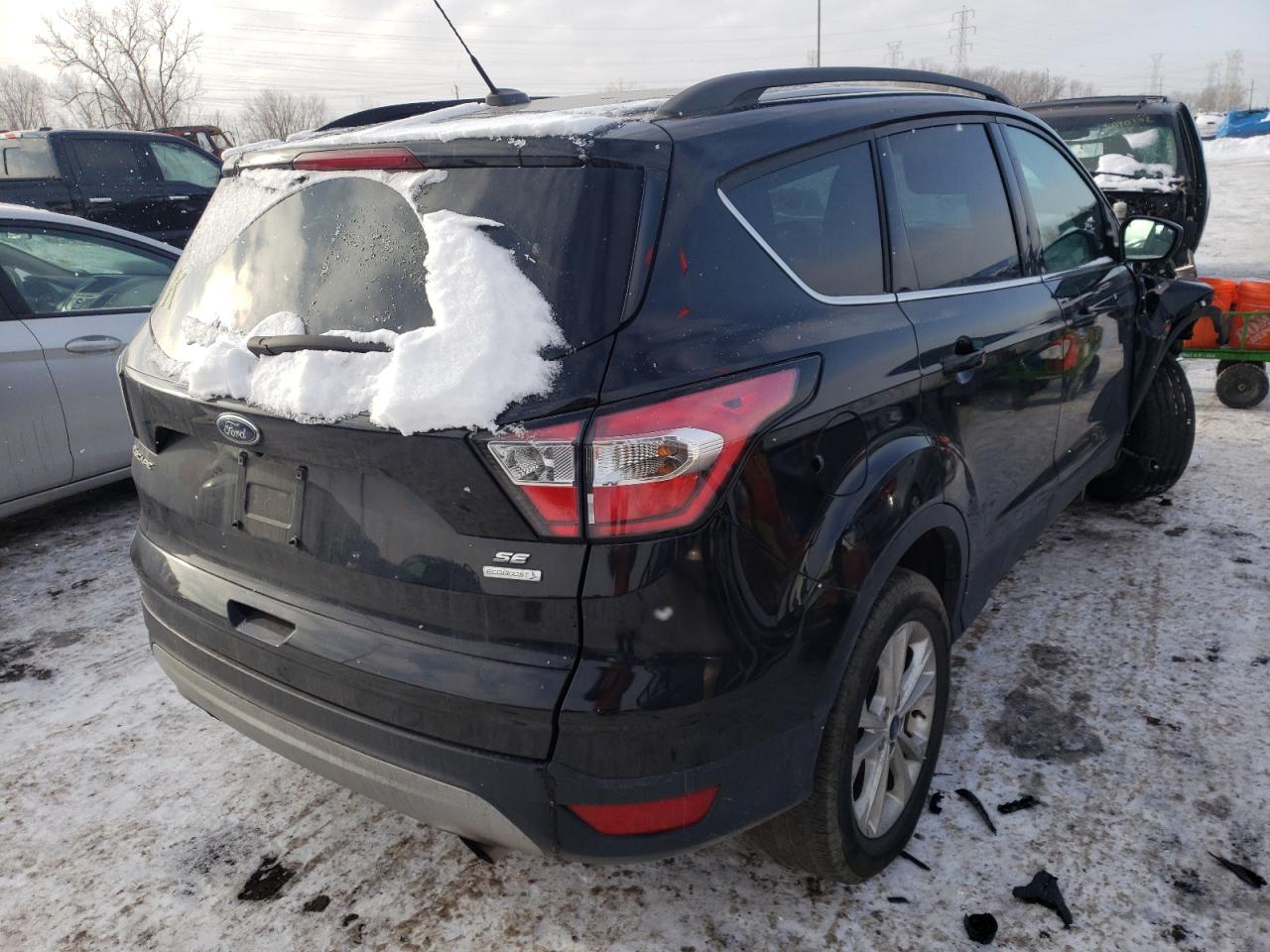 Photo 4 from auction – 2018 FORD ESCAPE SE with VIN 1FMCU0GD6JUA41328