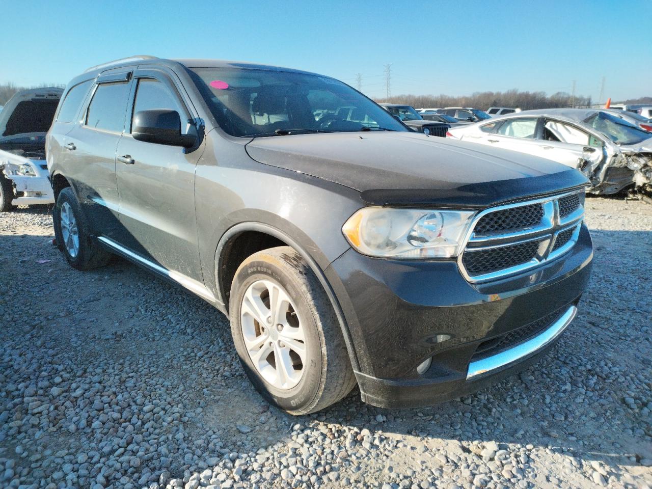 DODGE DURANGO EX 2011 with VIN 1D4RD2GG8BC696959 - Photo from auction