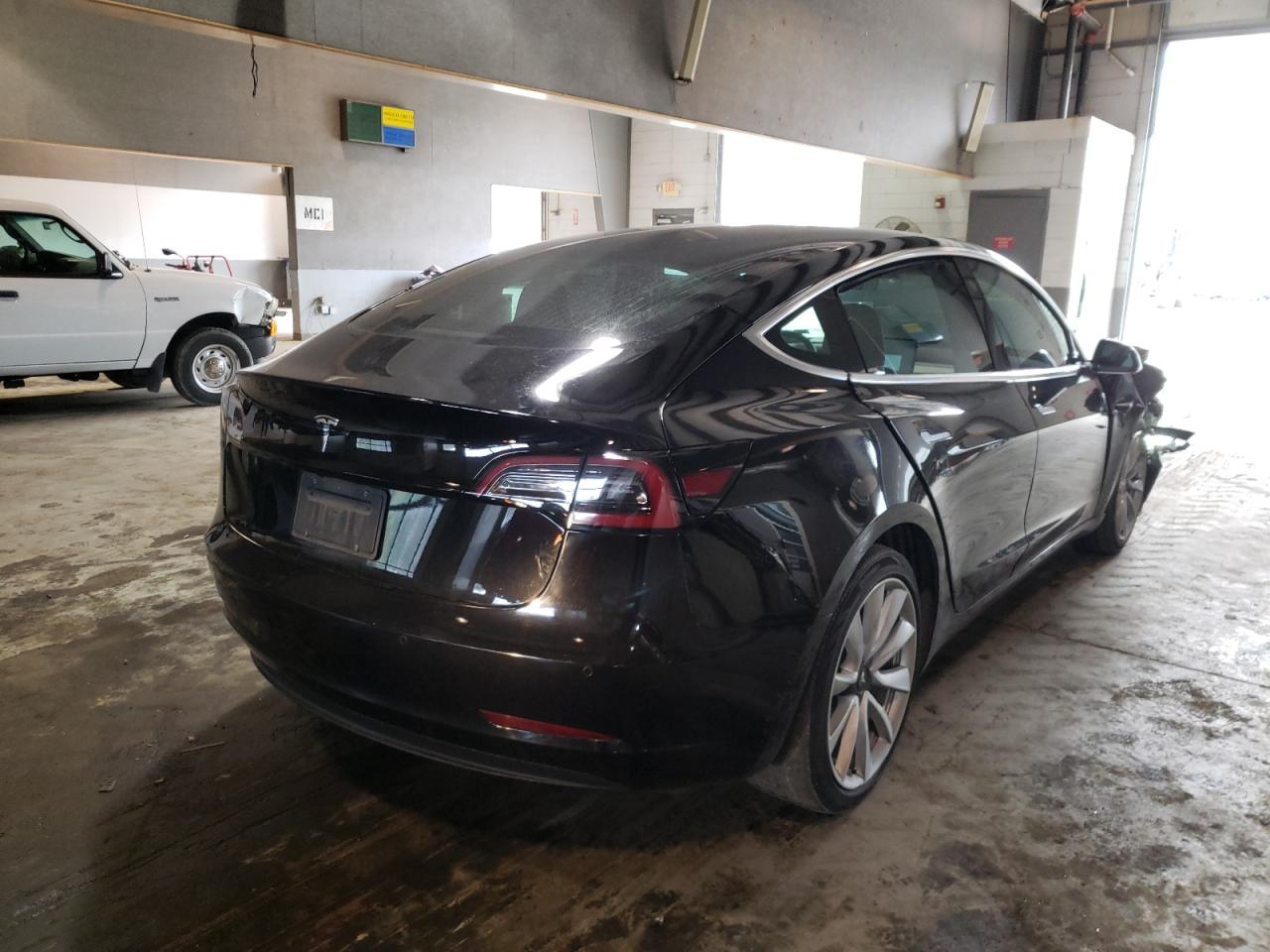 Photo 4 from auction – 2020 TESLA MODEL 3 with VIN 5YJ3E1EA1LF616091