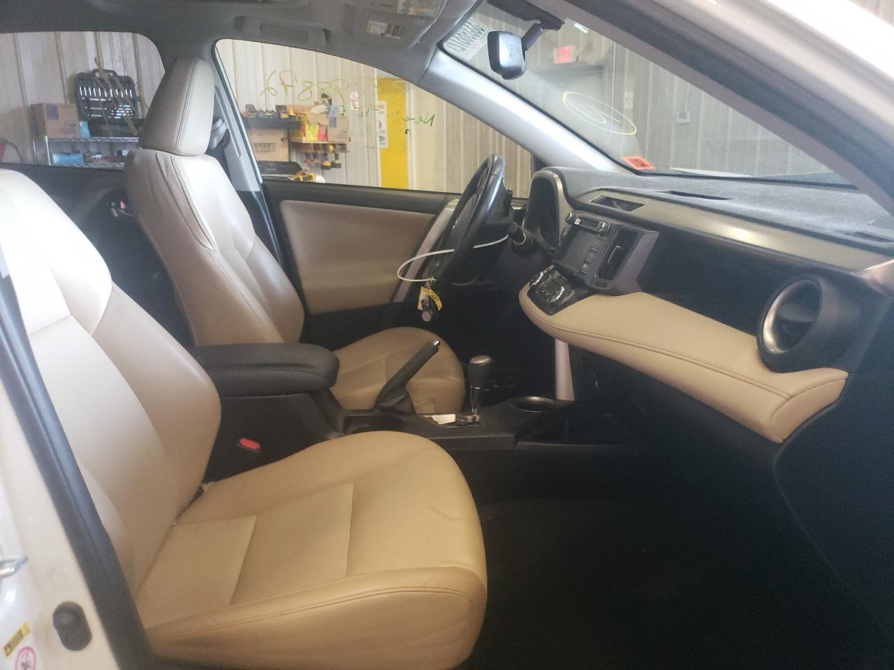 Photo 5 from auction – 2014 TOYOTA RAV4 LIMIT with VIN JTMDFREV1ED071393