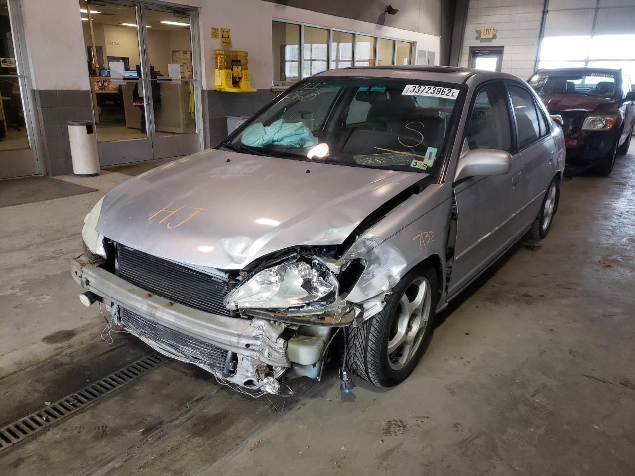 Photo 2 from auction – 2004 HONDA CIVIC EX with VIN 2HGES25724H513335