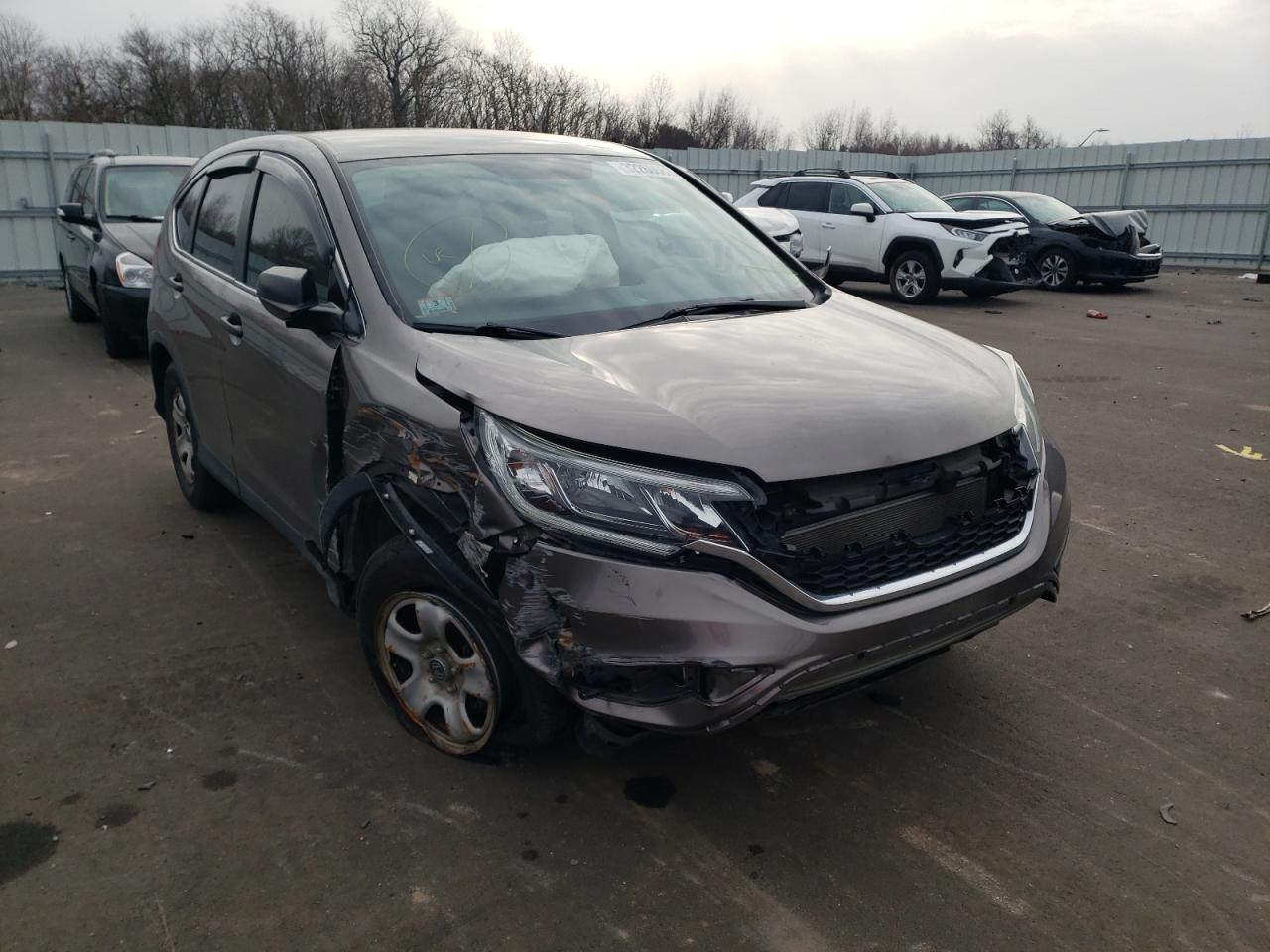 Photo 9 from auction – 2015 HONDA CR-V LX with VIN 5J6RM4H32FL130431